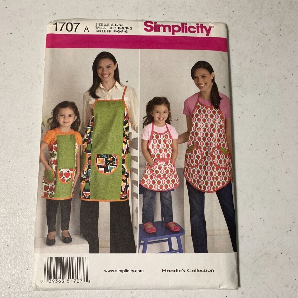 Simplicity sewing pattern aprons child and misses 1707 S M L 12 pieces UNCUT